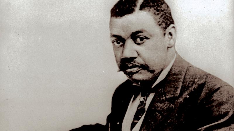 Portrait of African American man at desk