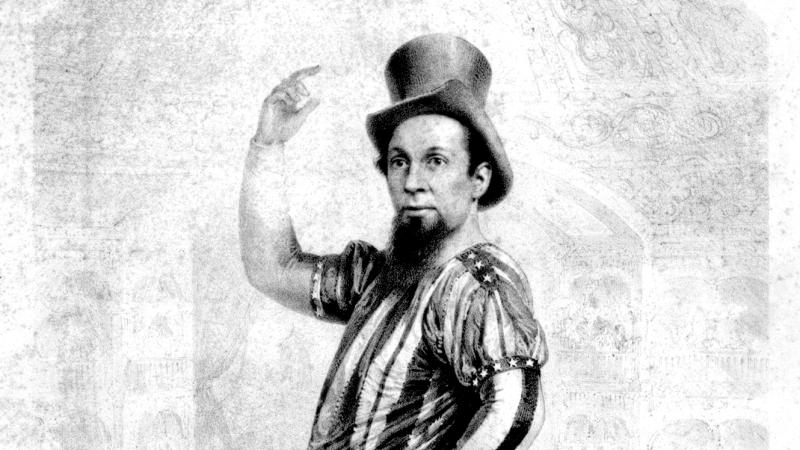 Black and white advertisement for a comedian's show, with a man dressed comically as Uncle Sam.