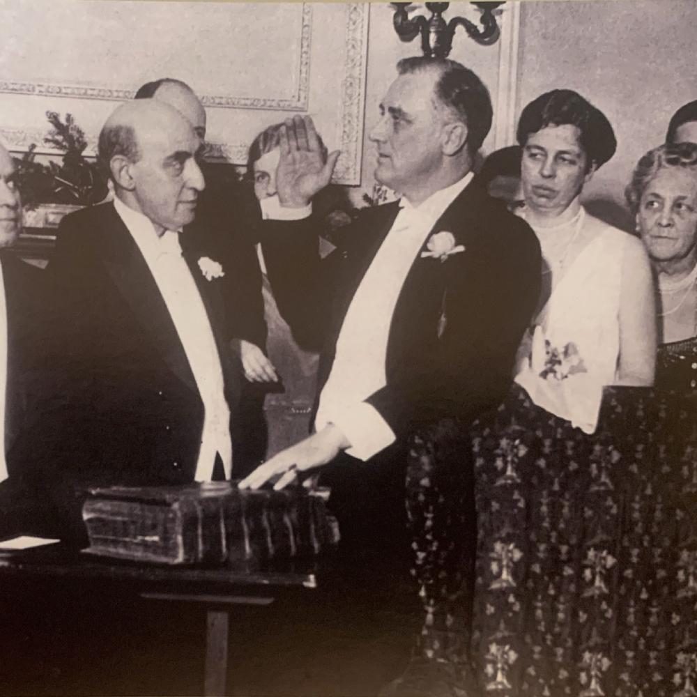 Black and white photo of Roosevelt is sworn in as governor of New York in 1929, a preamble to his successful presidential run in 1932.