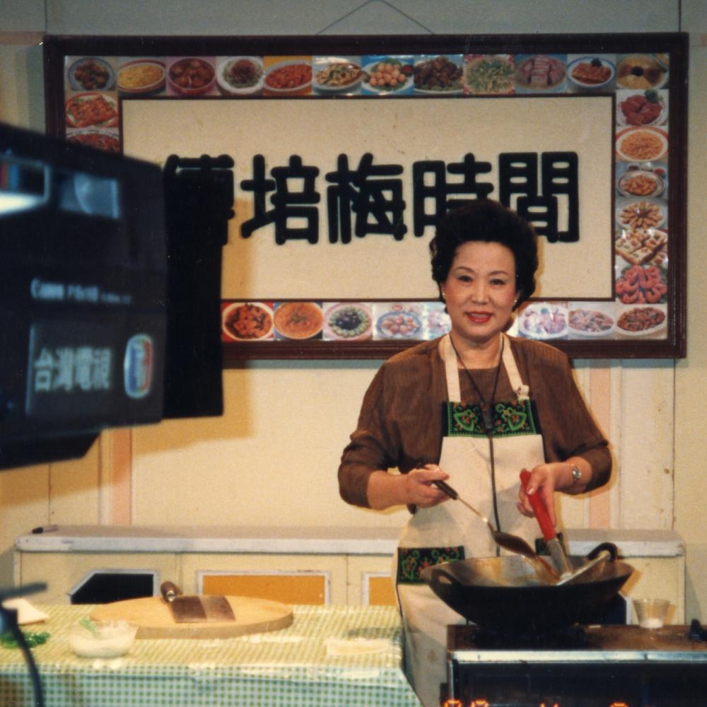Fu Pei-Mei prepares a meal in front of a television camera