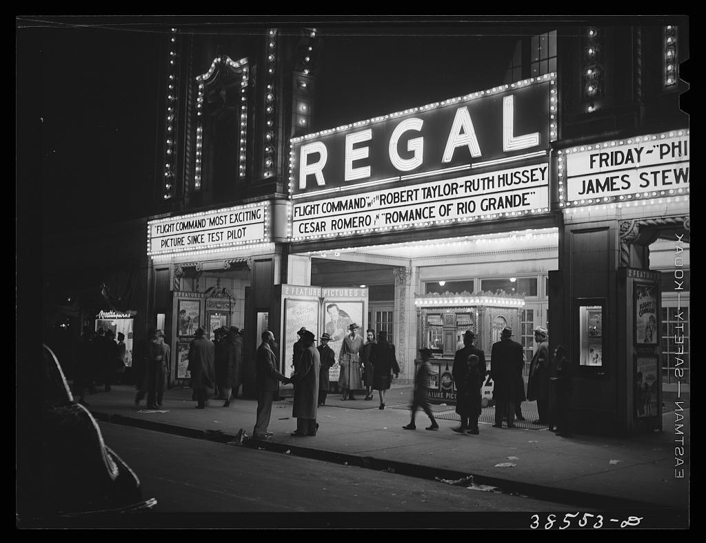 Lee, Russell, photographer. Movie theater. Southside, Chicago, Illinois. Apr. Photograph.