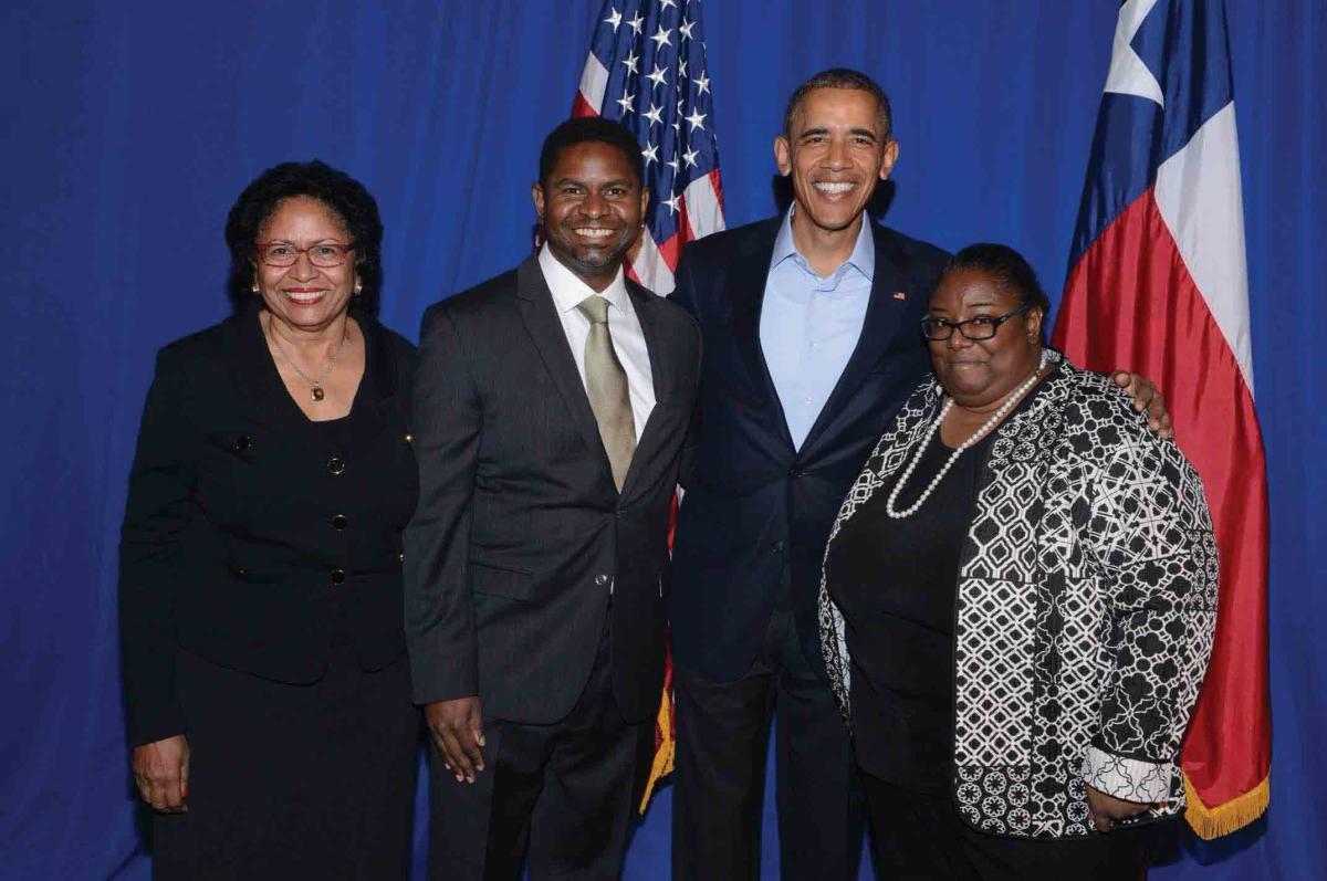 Simmons with children and Obama