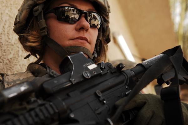 Female American soldier in Iraq, in full field uniform.