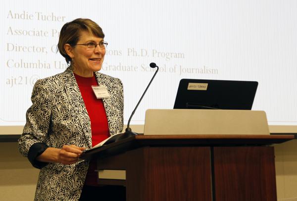 Woman speaking at a podium