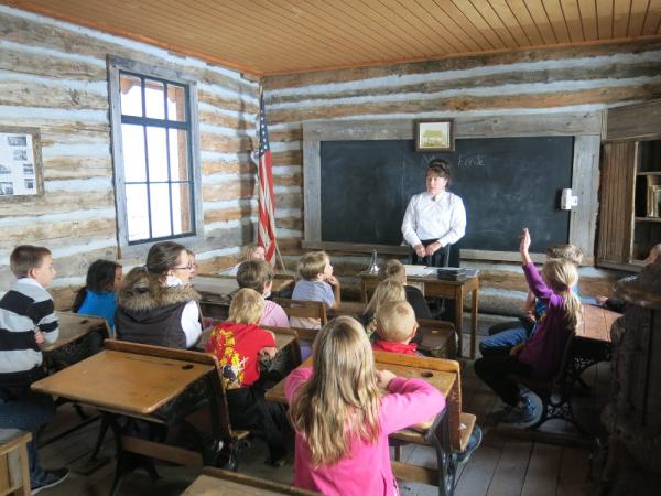 Children sitting in a classroom 