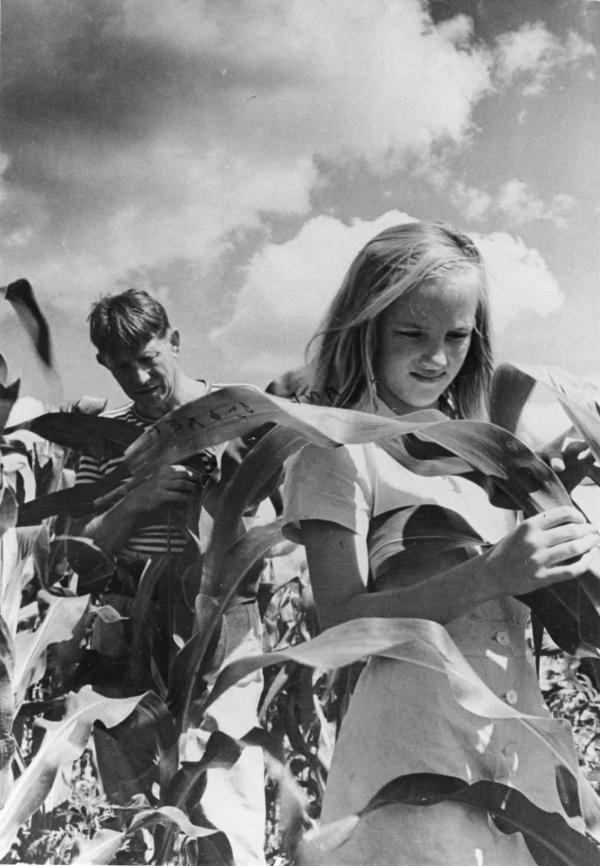 Bromfield and daughter in field