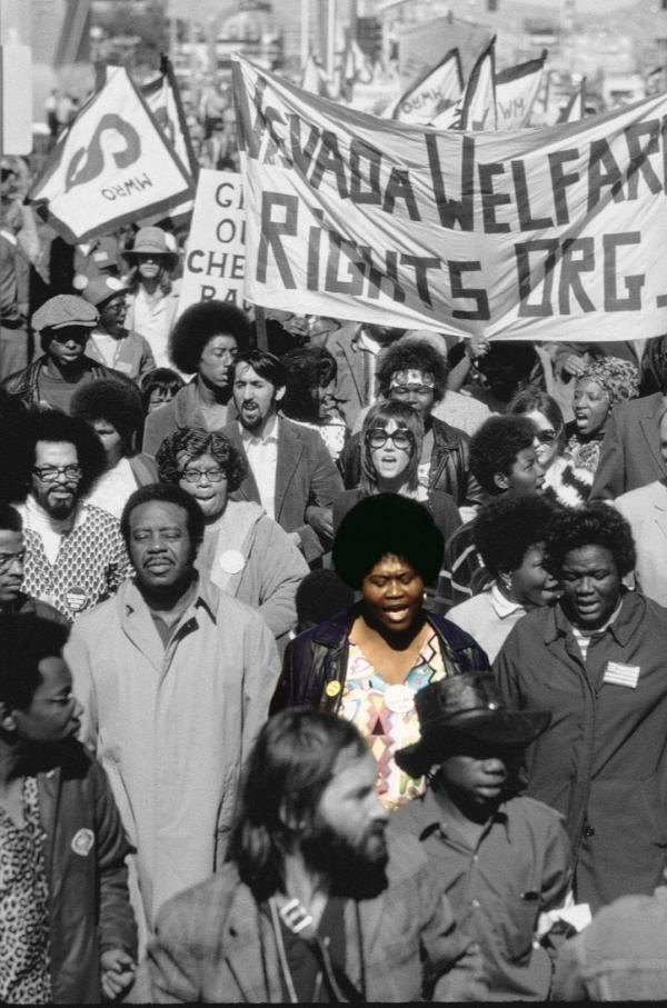 Black and white image of the march on The Strip with Ruby Duncan highlighted in color.
