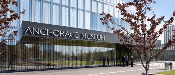 Image of digital rendering of the Anchorage Museum entryway, with a glass building that says "Anchorage Museum"