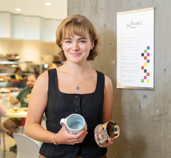 Kendall Bocklet at the opening of Cafe Louise, featuring ceramics from the Rosenfield collection. 