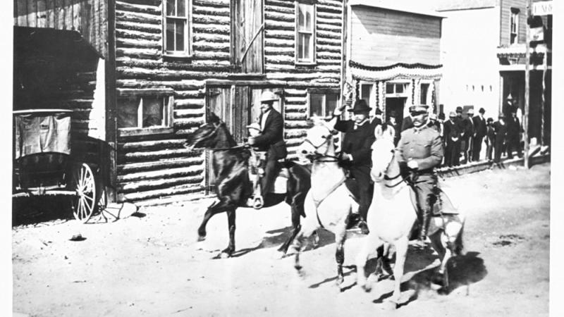 President Theodore Roosevelt riding to the dedication of the arch at Gardiner.