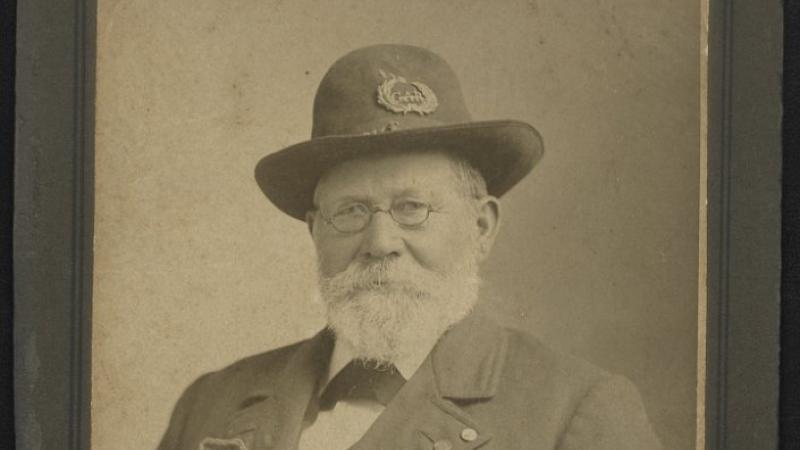 black and white photo of civil war veteran in full regalia