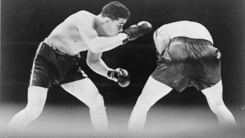 Joe Louis looks for an opening during a boxing match with Max Schmeling, 1936