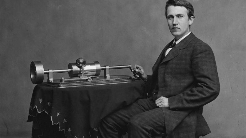 Thomas Edison with phonograph, 1870s.