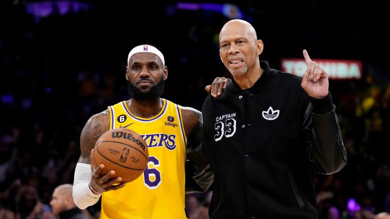 LeBron James and Kareem Abdul-Jabbar pose for photo.